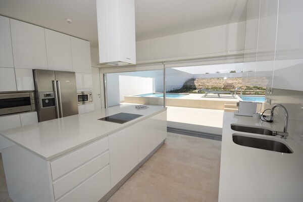 Foto van Morden architecturale villa in Lissabon - Vakantiehuis in Vau - Kitchen