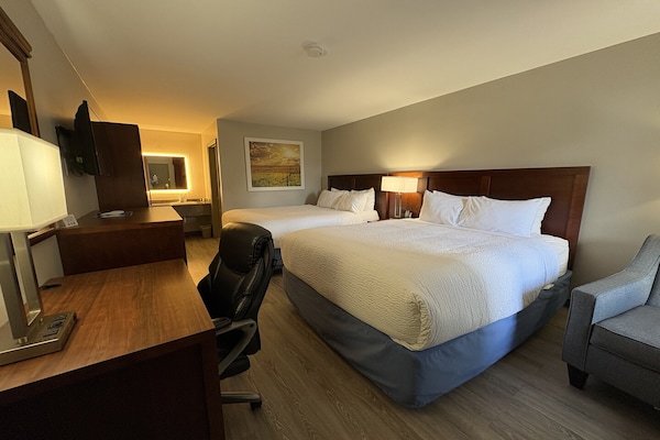 Foto van 3 Queensize bedden | Hampton - Vakantiehuis in Hampton, SC - BedRoom