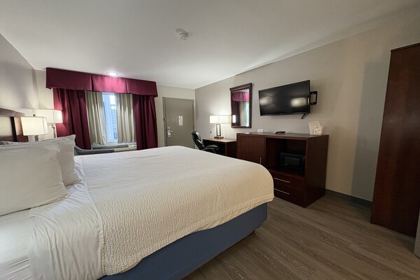 Foto van 3 Queensize bedden | Hampton - Vakantiehuis in Hampton, SC - BedRoom