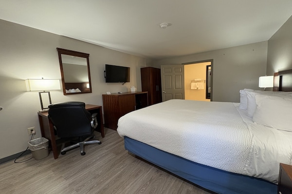 Foto van 3 Queensize bedden | Hampton - Vakantiehuis in Hampton, SC - BedRoom