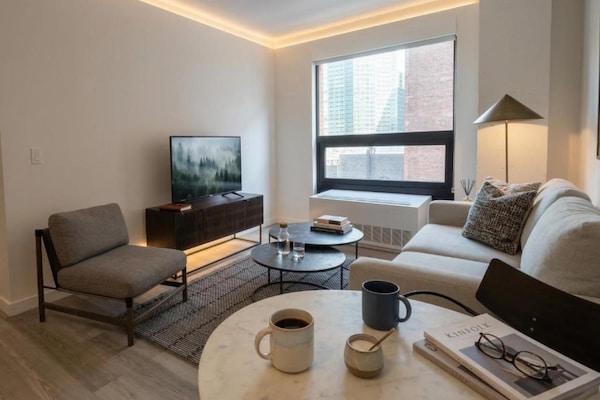 Foto van Luxe appartement met 2 slaapkamers | Court Square - Vakantiehuis in New York City - LivingRoom