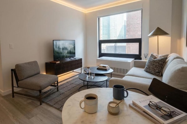 Foto van Luxe appartement met 2 slaapkamers | Court Square - Vakantiehuis in New York City - LivingRoom